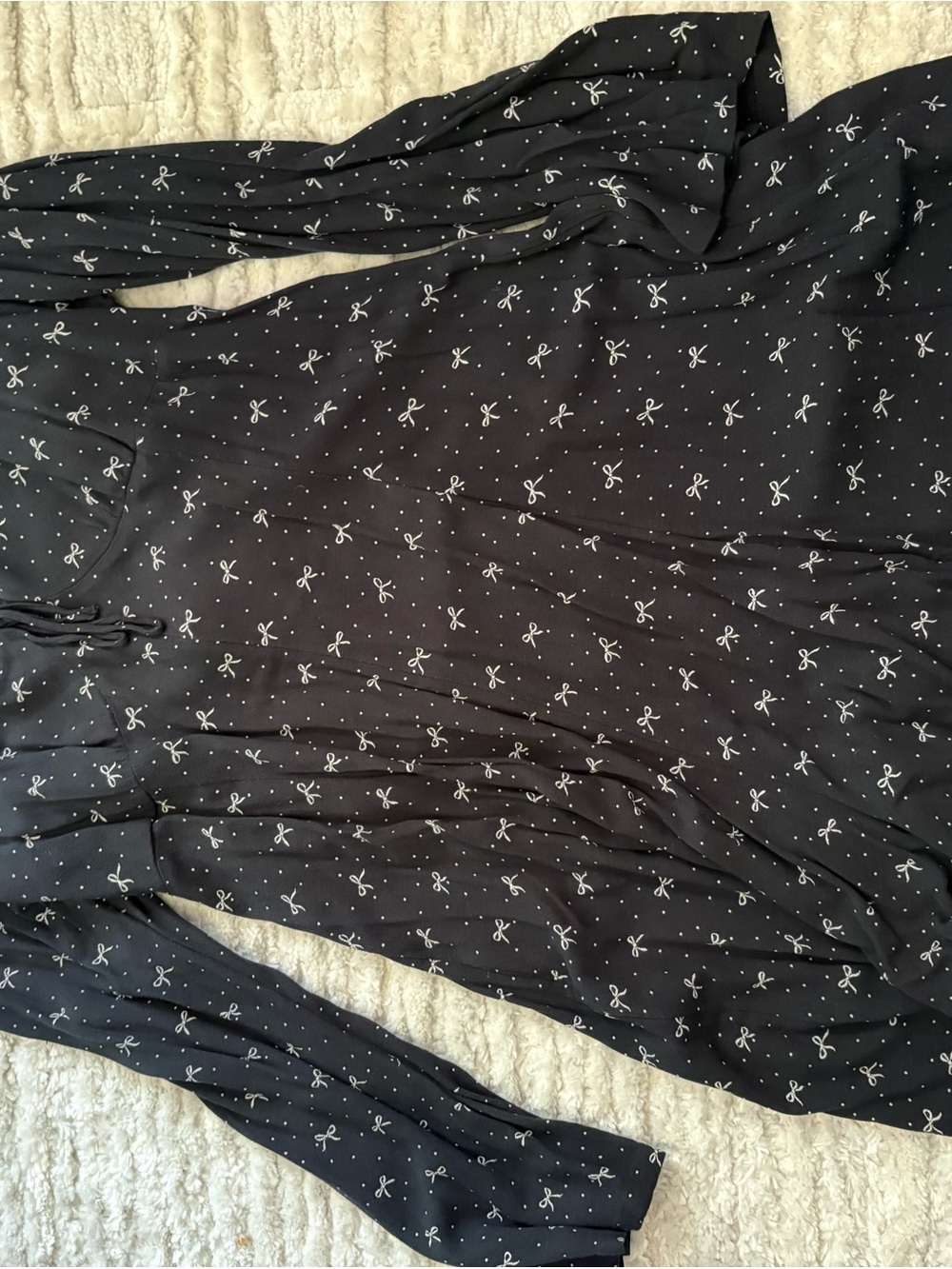 American Eagle Outfitters Navy Long-Sleeve romper with White Bow Pattern